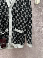 Gucci long-sleeve polo-style top with black and light gray GG monogram pattern