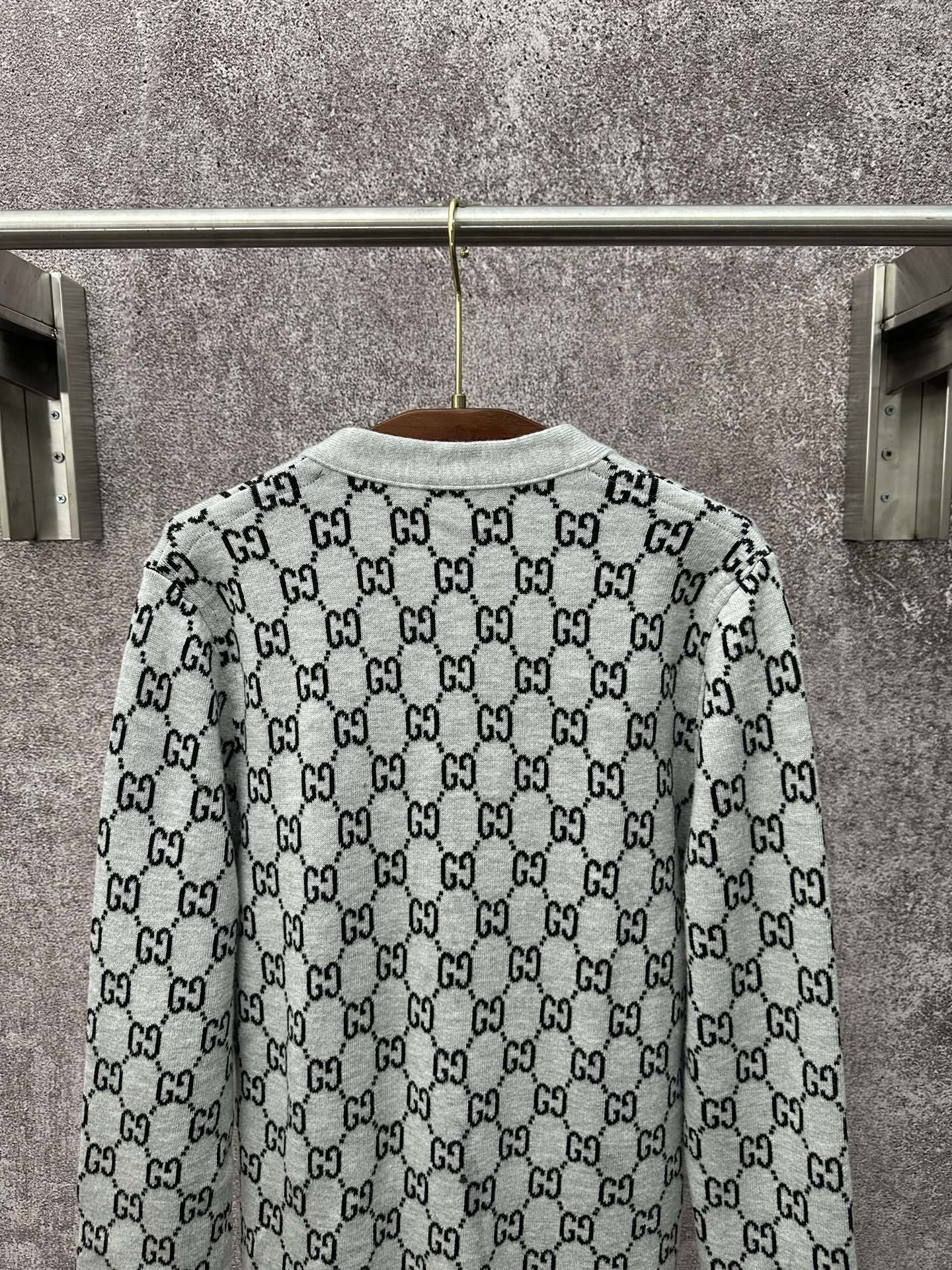 Gucci long-sleeve crewneck top with light gray GG monogram and dark buttons