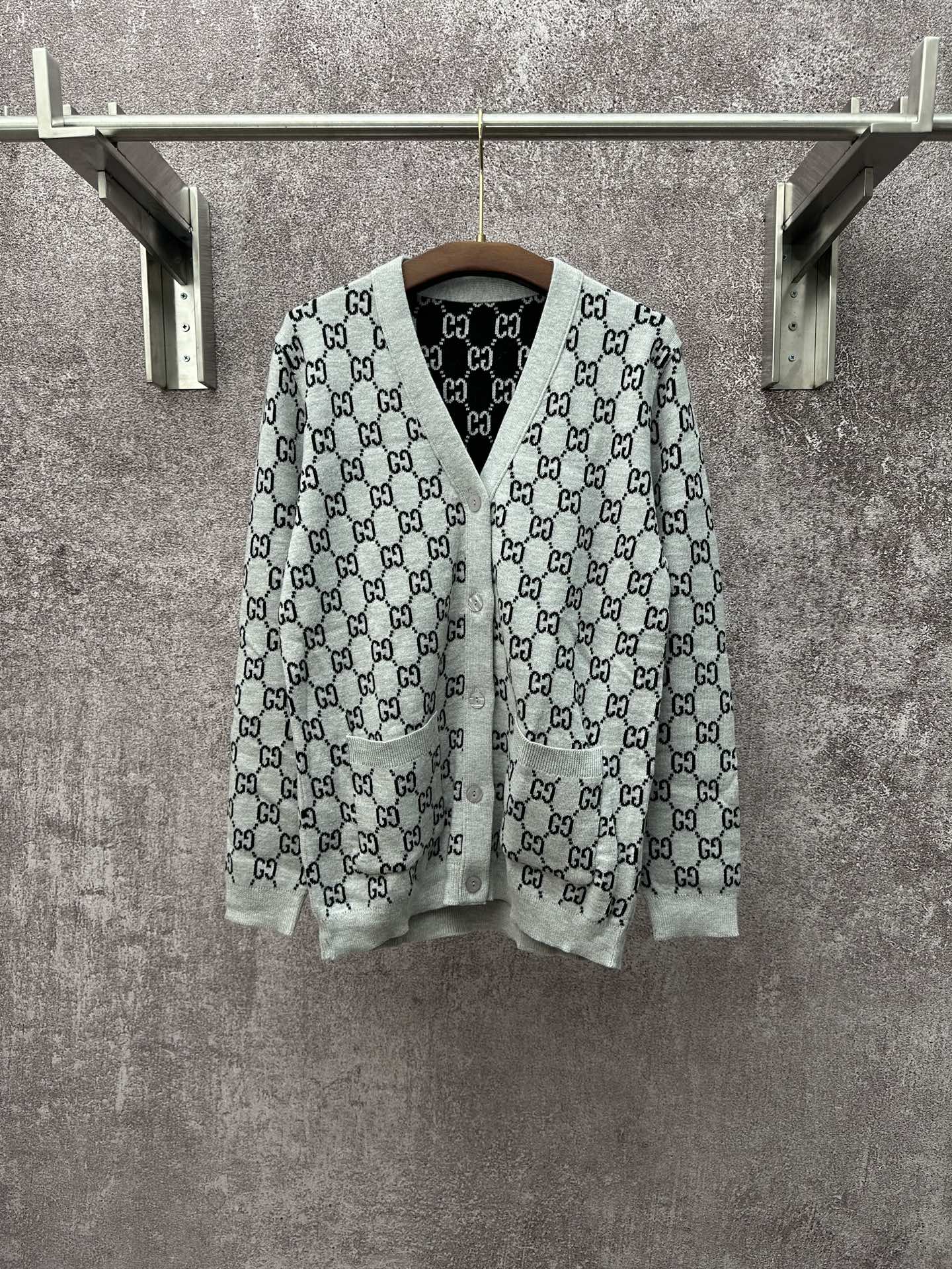 Gucci long-sleeve V-neck top with gray and black GG monogram pattern