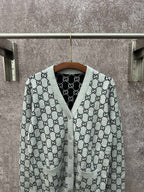 Gucci long-sleeve V-neck top in light gray with black GG monogram pattern