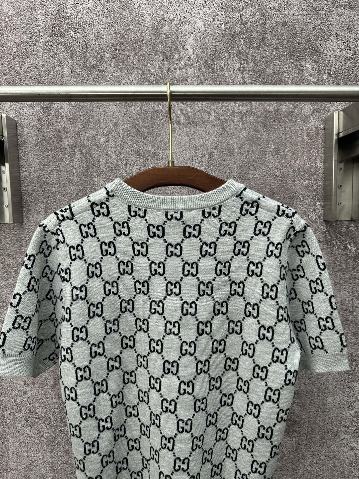 Light gray knit T-shirt with allover black GG logo pattern and crew neck