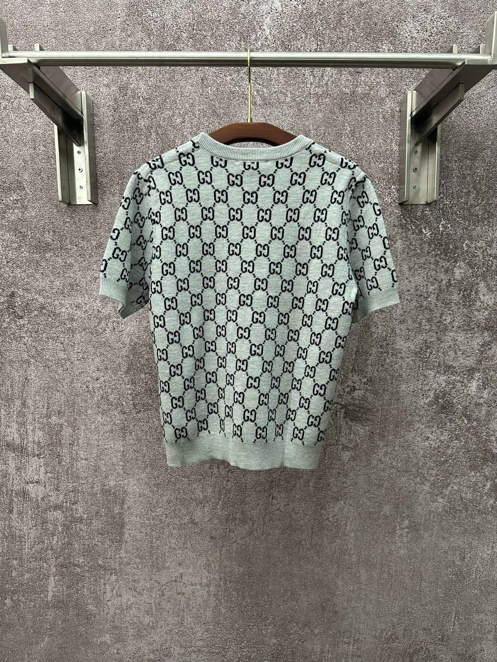 Light gray knit T-shirt with allover black GG logo pattern and short sleeves