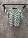 Light gray knit T-shirt with allover black GG pattern and ribbed crew neck