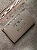 Fendi bag leather logo patch with 'MADE IN ITALIA' on zipper edge