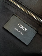 Fendi crossbody bag interior label reading FENDI and MADE IN ITALY