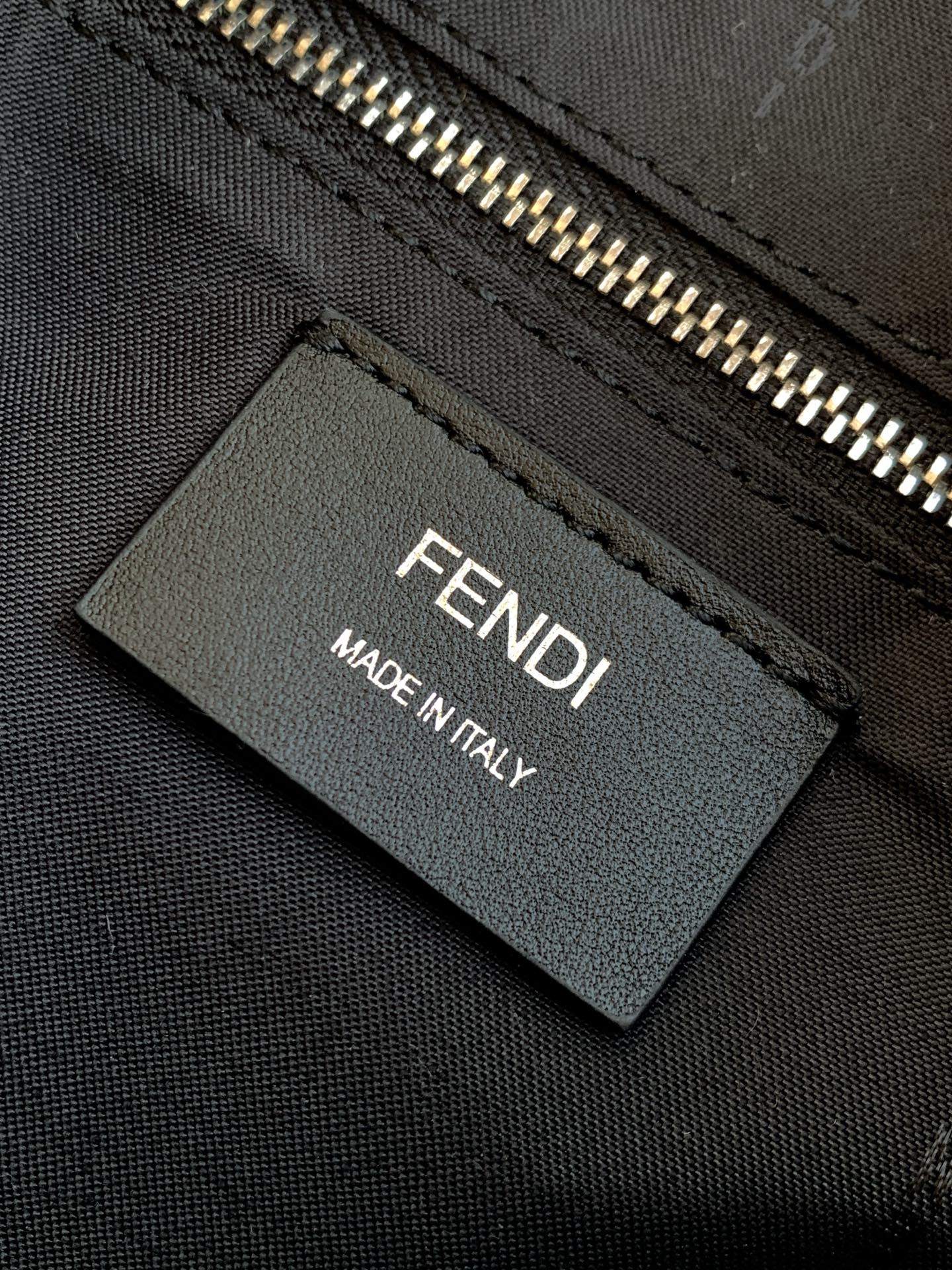 Fendi crossbody bag interior label reading FENDI and MADE IN ITALY