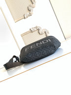 Fendi crossbody bag with dark FENDI pattern fabric and top zip closure