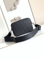 Fendi logo crossbody bag with dark strap and silver zipper hardware