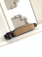 Fendi tan leather crossbody bag with black strap and gold-tone buckle hardware