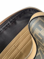 Fendi crossbody bag interior with black lining and tan leather edge