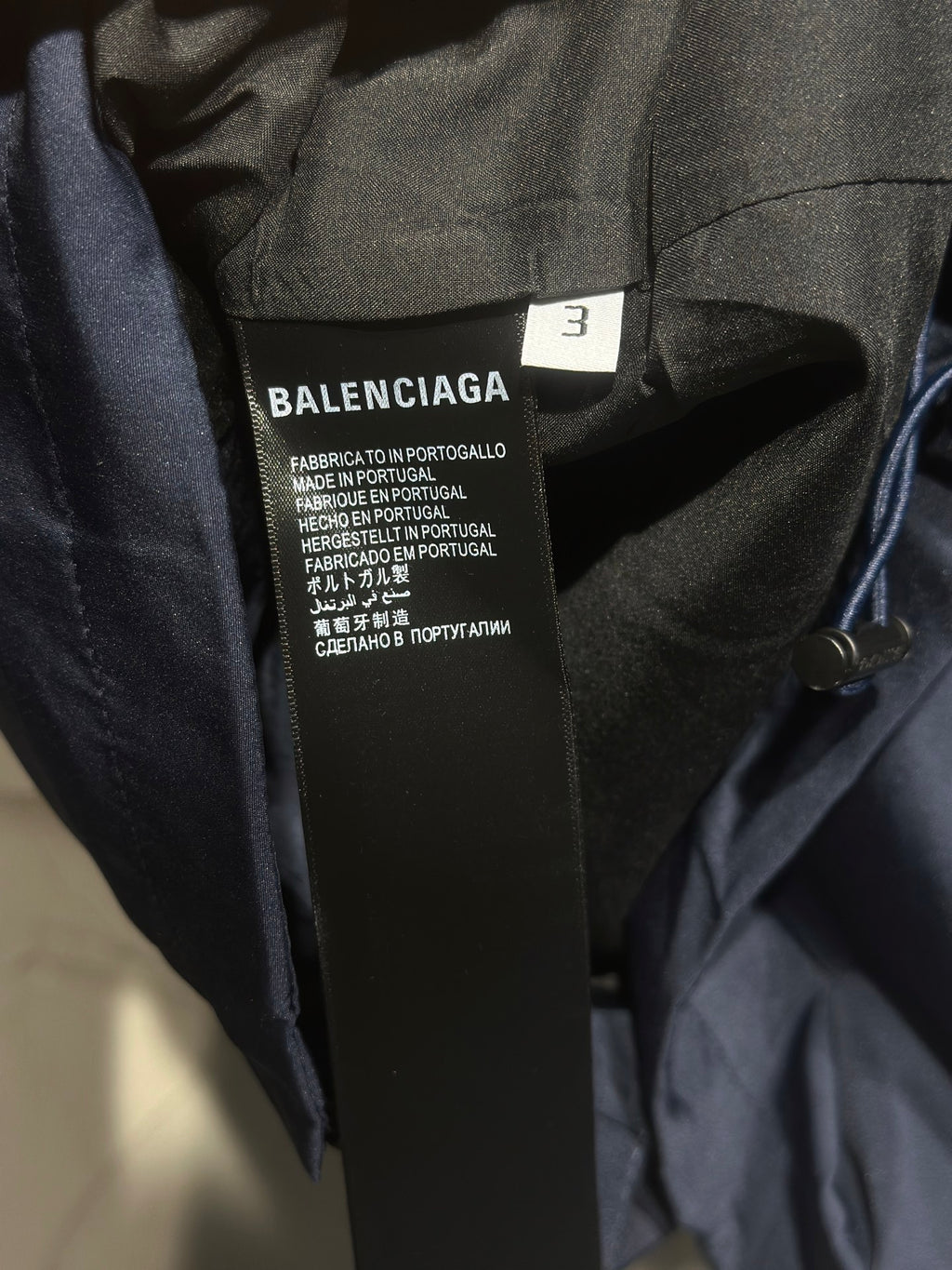 Balenciaga inner neck label with size number and fabric origin text