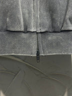 Balenciaga zip-up hooded jacket cuff and central zipper detail, dark gray fabric