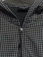 Black and white plaid zip-up hoodie with hood lining and small front zipper