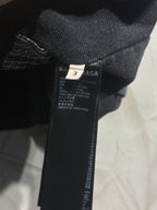 Balenciaga inside neck label on dark hooded jacket
