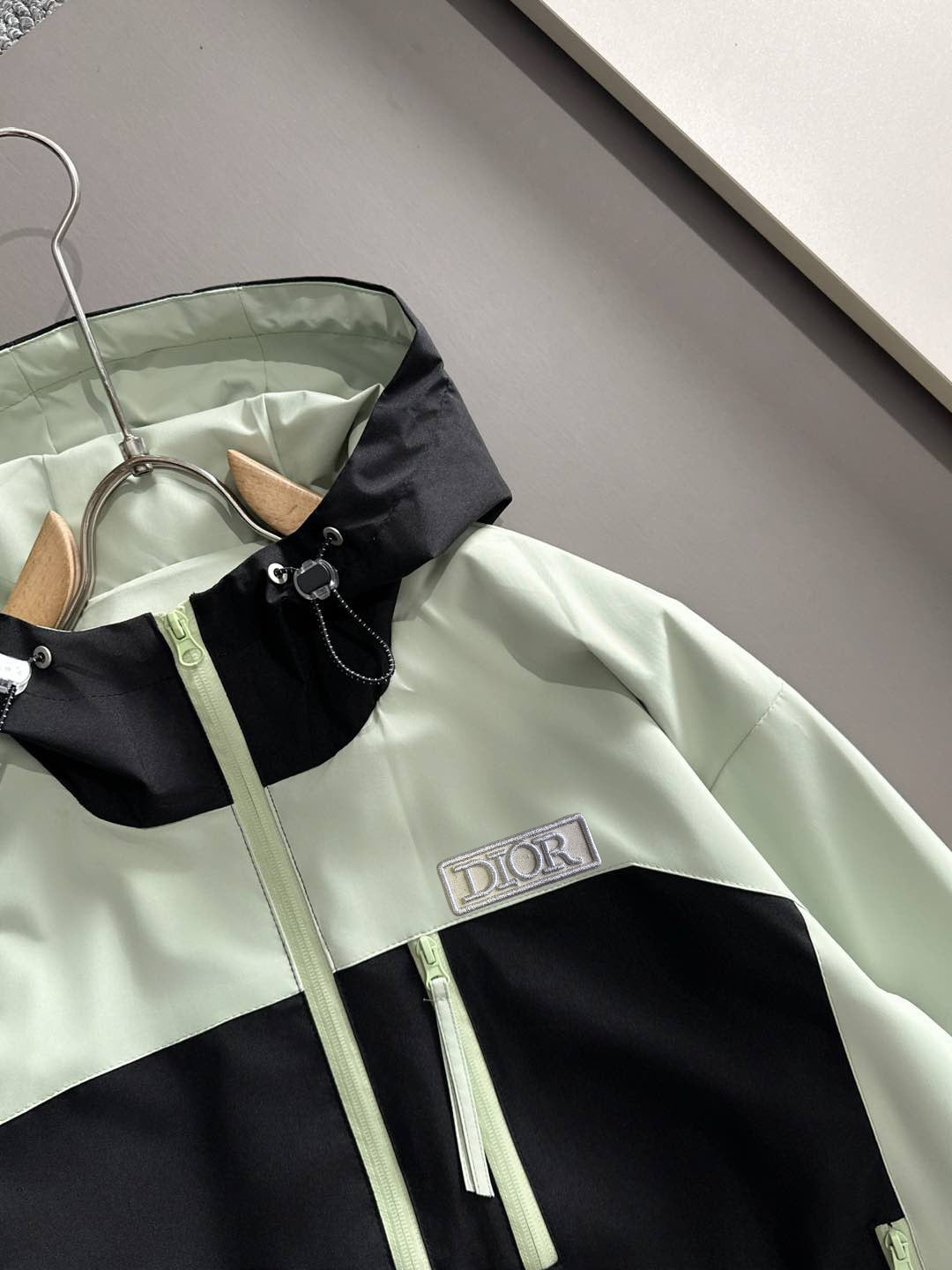 Mint and black hooded jacket with Dior patch, zip front and drawstrings