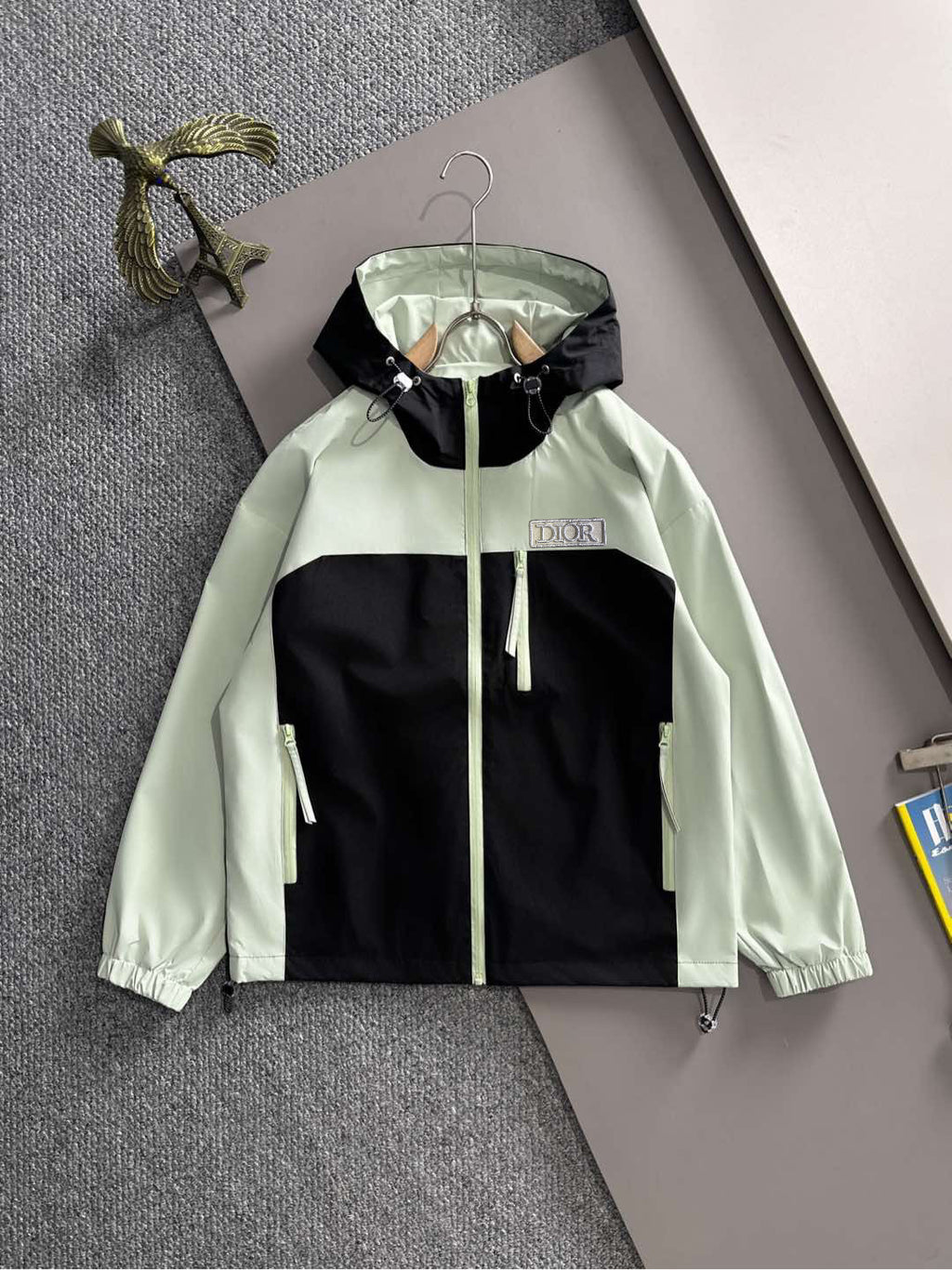 Mint and black long jacket with hood, front zip and drawstring hem
