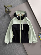 Mint and black long jacket with hood, front zip and drawstring hem