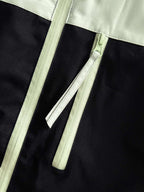 Two-tone jacket with light zipper and pull tab at center front
