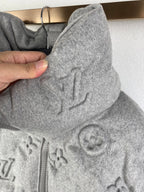 Louis Vuitton hooded jacket side view, gray monogram fabric and drawstring hood
