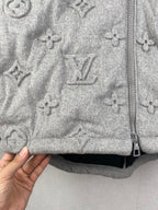 Louis Vuitton hooded jacket close-up, gray allover monogram and center zipper