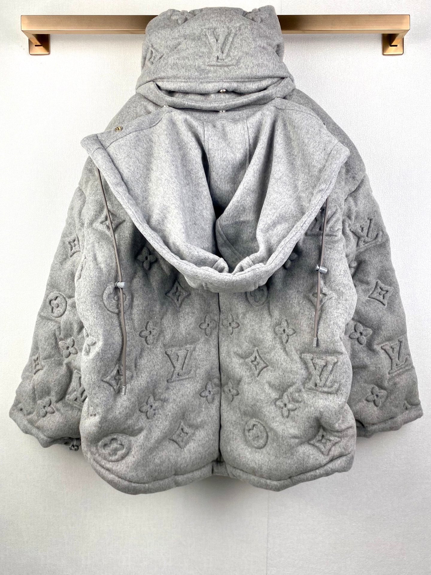 Louis Vuitton hooded puffer jacket, gray allover monogram, hood and pocket view