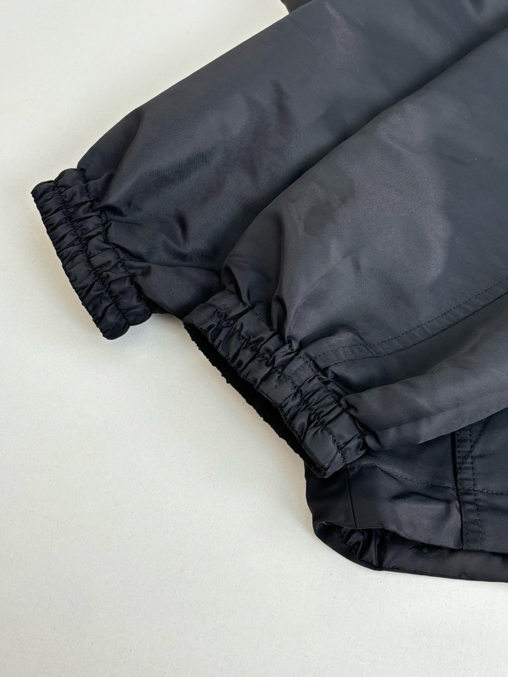 Louis Vuitton long coat sleeve cuff with ruched elastic and dark fabric