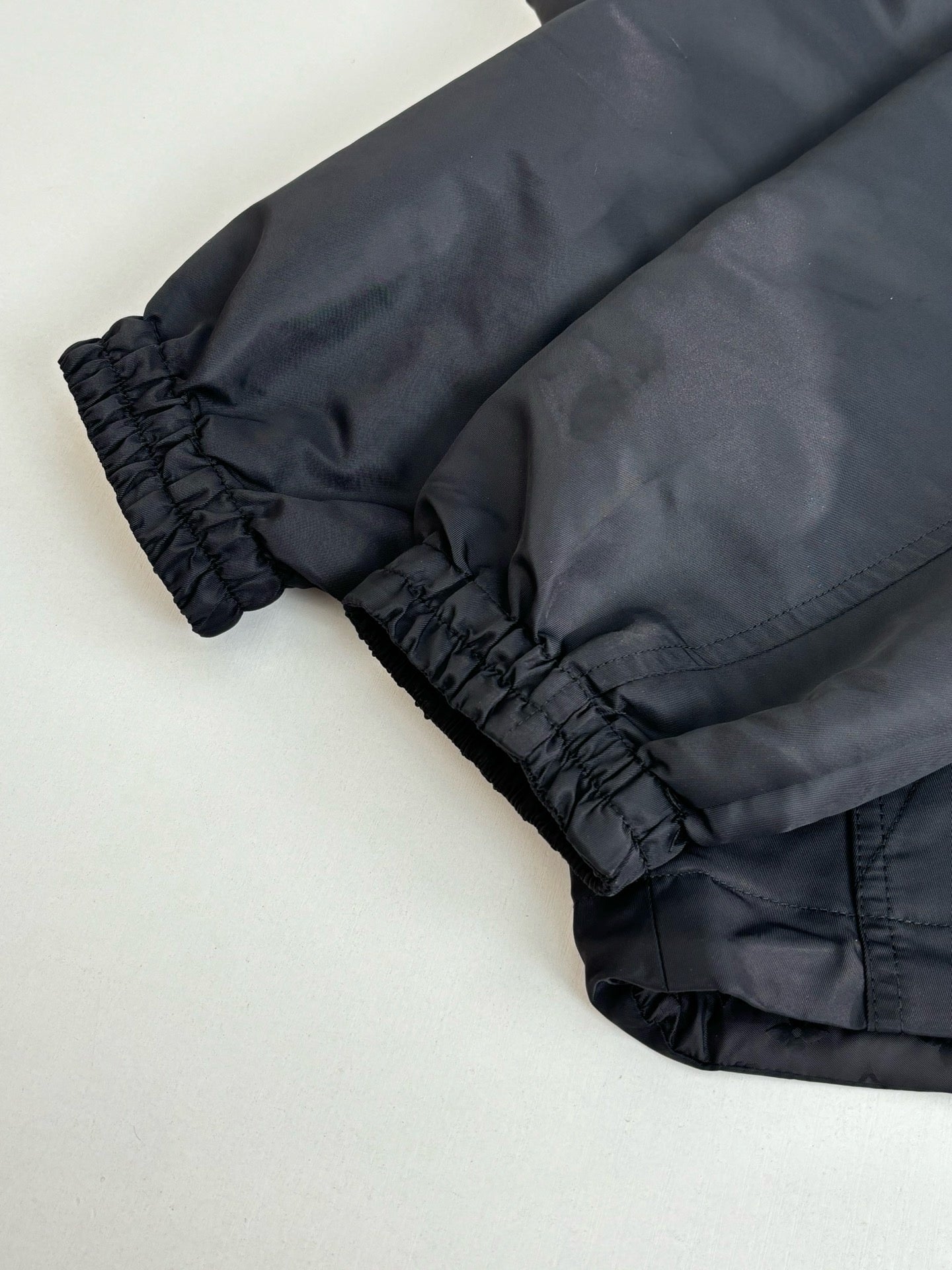 Louis Vuitton long coat sleeve cuff with ruched elastic and dark fabric