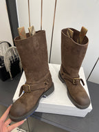 Pair of dark brown suede tall boots with side buckles and padded ankle cuffs