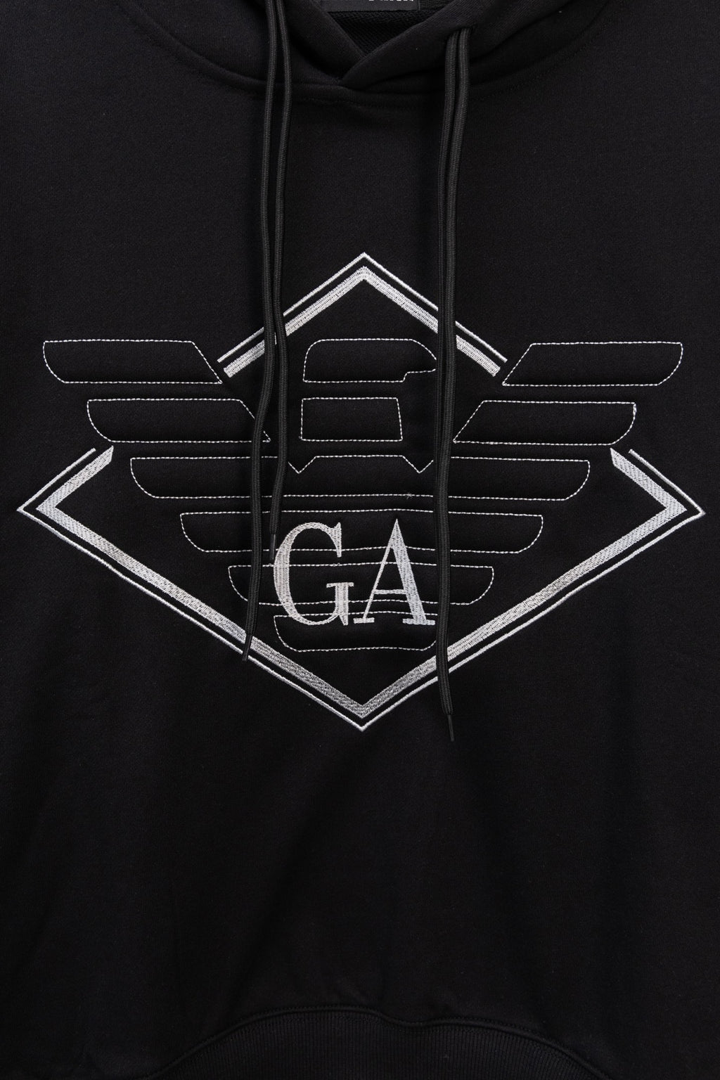 Black pullover hoodie with large center logo print and drawstring cords