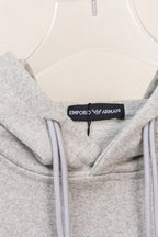Amiri hoodie neckline detail with hood lining and logo label at collar