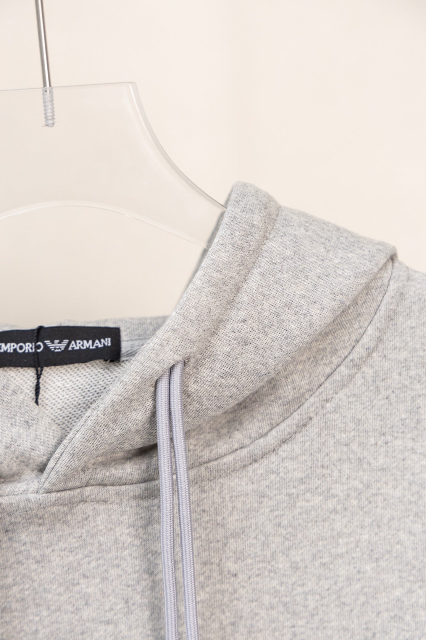 Amiri hoodie light gray heather with pale drawcords and ribbed cuffs