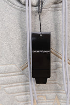 Amiri hoodie with drawstrings and hanging Emporio Armani brand tag