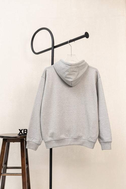 Amiri hoodie in light gray heather with attached hood and long sleeves