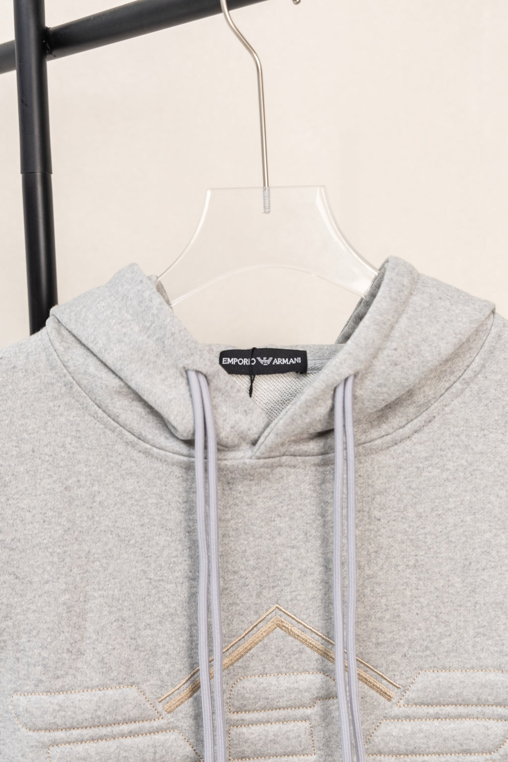 Amiri hoodie in light gray heather with embroidered V-style front design