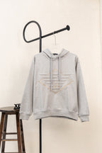 Amiri hoodie in light gray heather with hood, drawstring, and front pouch pocket