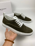 Olive suede sneakers with white laces and white rubber sole, Givenchy logo tongue tag.