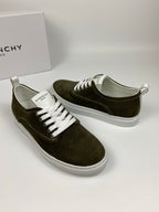 Olive suede sneakers shown from side angles, white laces and white rubber soles.