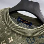 Ribbed crew neck sweater detail with Louis Vuitton woven label at collar