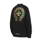 Black long-sleeve shirt, back view, with large circular colorful graphic and logo patch