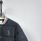 Moncler puffer jacket chest patch with striped collar trim
