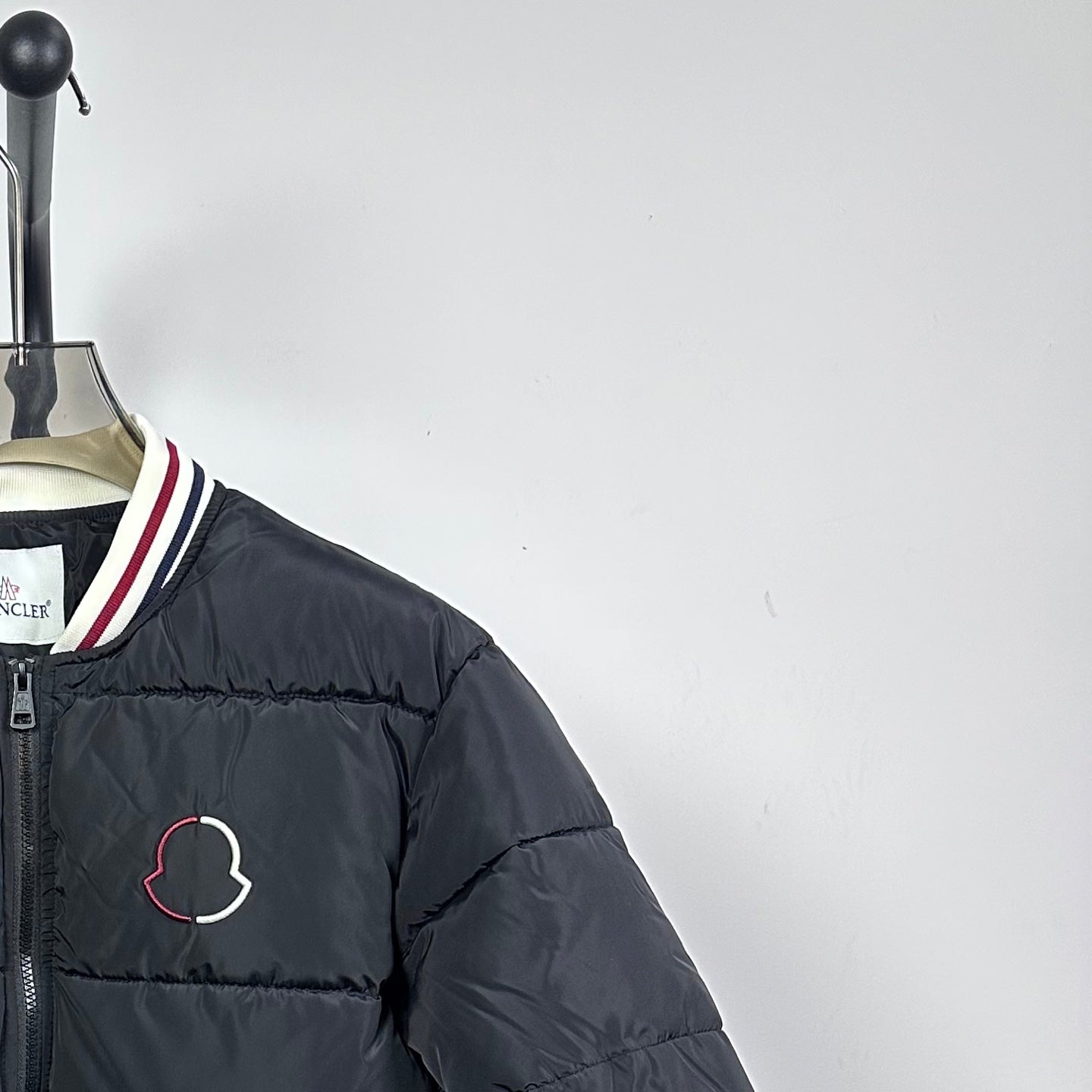 Moncler puffer jacket chest patch with striped collar trim