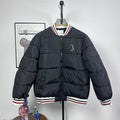 Moncler quilted puffer jacket with zip front and striped ribbed cuffs