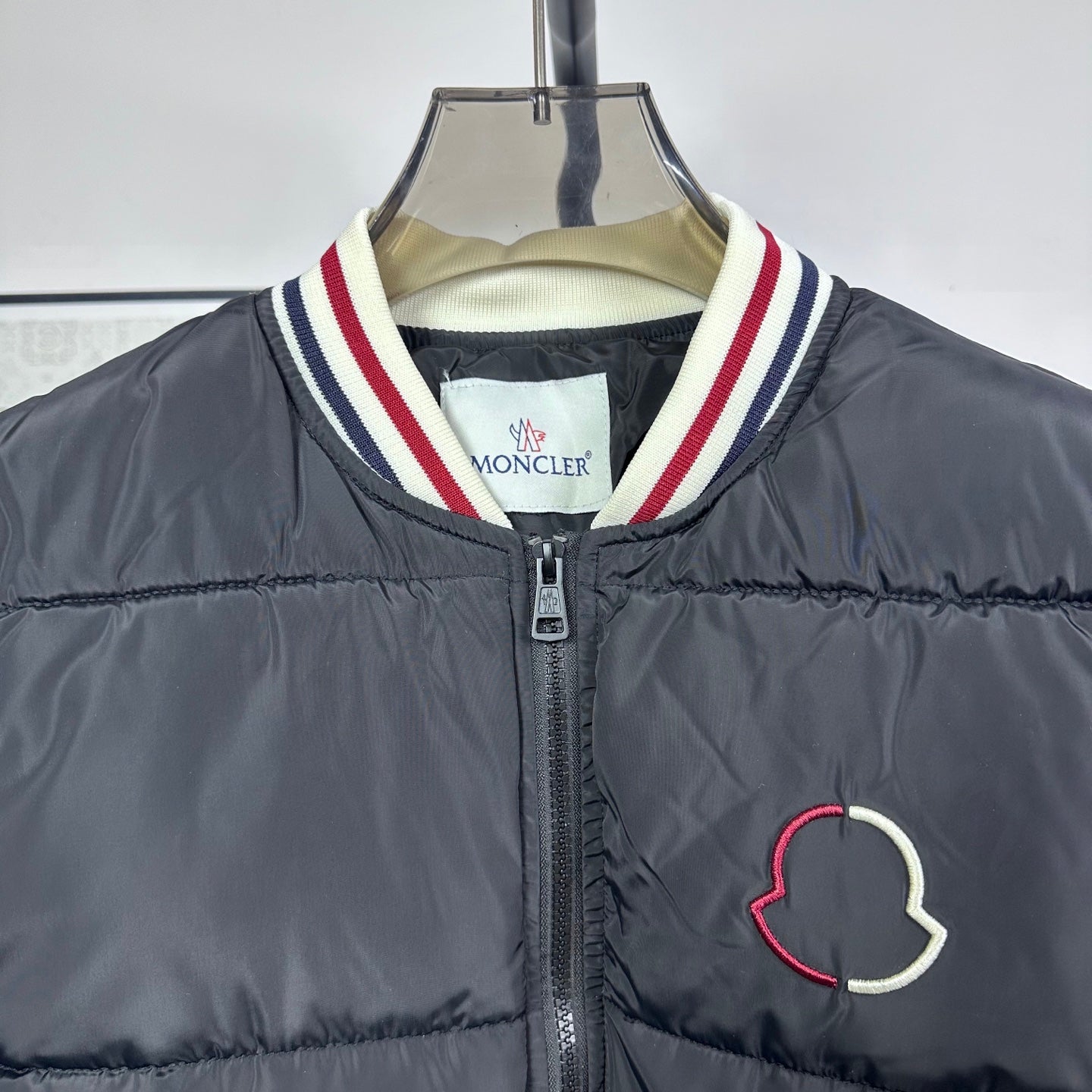 Moncler puffer jacket with striped collar and MONCLER logo patch