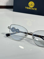 Versace aviator eyeglasses with silver-tone frame and light blue tinted lenses