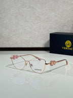 Versace aviator eyeglasses with rose-gold frame and clear lenses