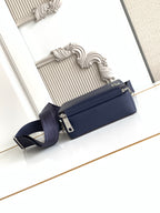 Fendi navy mini shoulder bag with top zip, silver hardware, and adjustable strap.