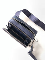 Fendi navy top-zip crossbody bag with two front pockets and adjustable shoulder strap.