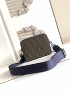 Fendi navy and brown FF jacquard crossbody bag with adjustable strap and front zip.