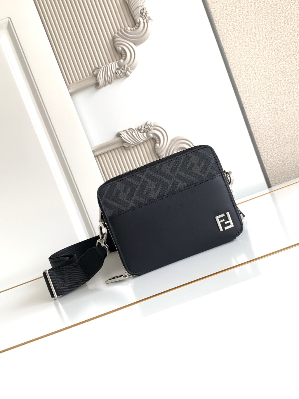 Fendi crossbody bag with black FF logo front and adjustable strap
