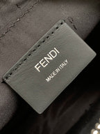 Label patch on crossbody bag reading FENDI MADE IN ITALY